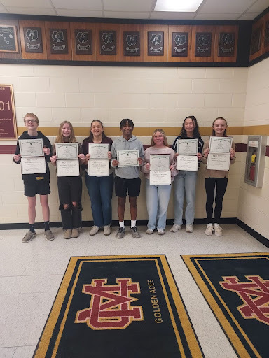 Science Fair Students holding their award certificates