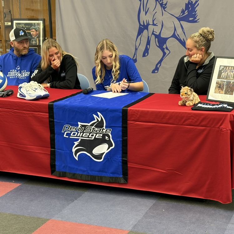 Elise volleyball signing to Peru State