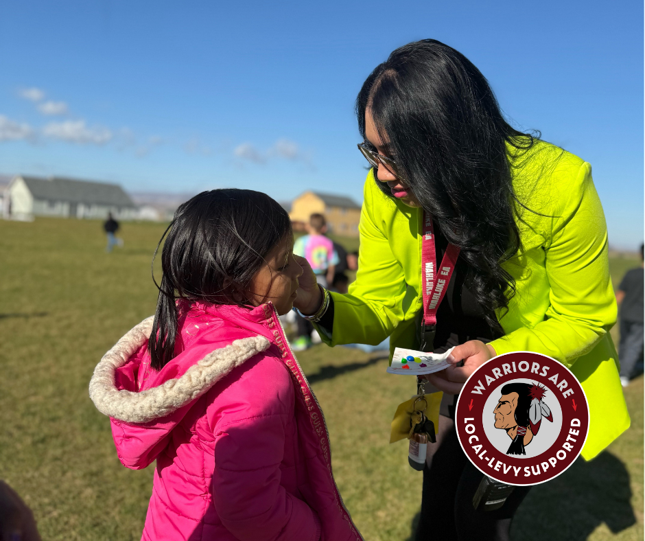 Counselors doing Face Paint