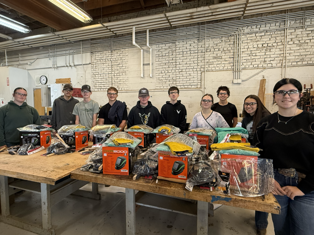 Welding students with their new welding kits.