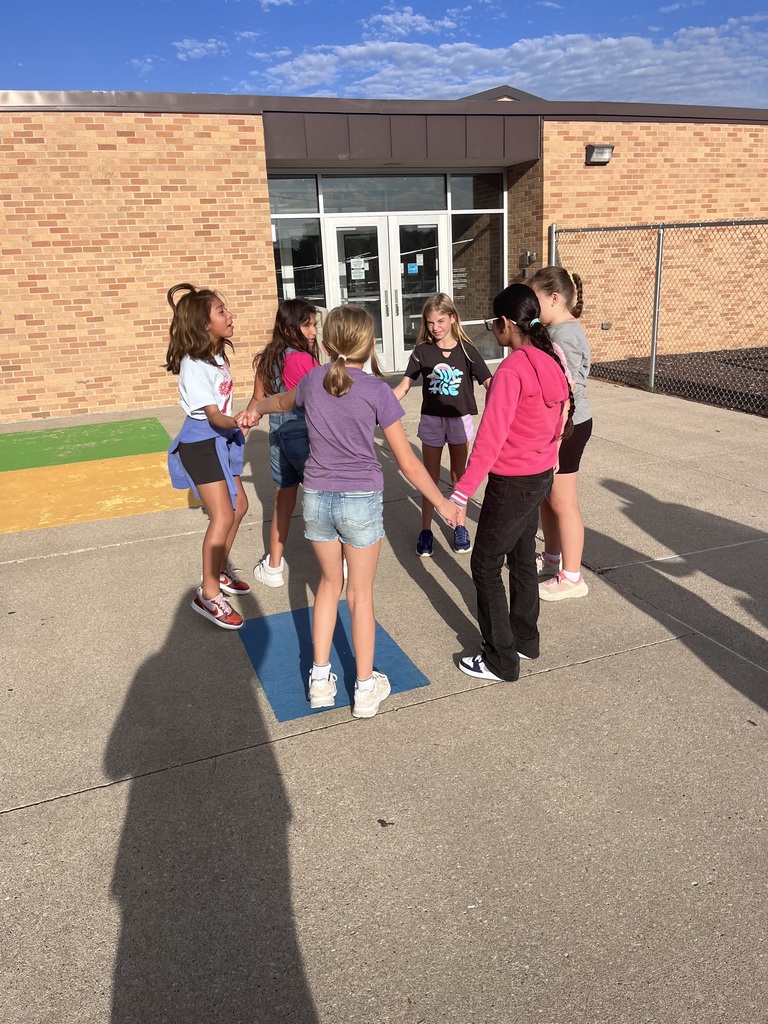 5th graders practicing their teamwork with the Human Knot