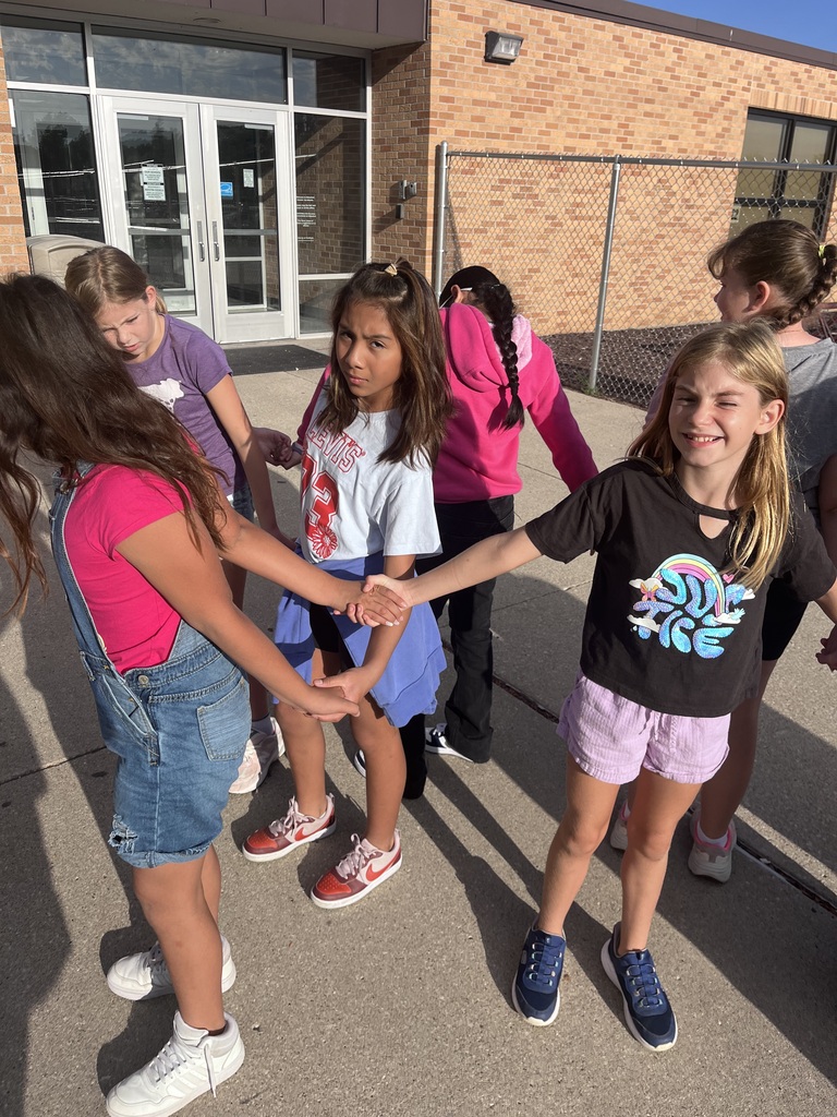 5th graders practicing their teamwork with the Human Knot