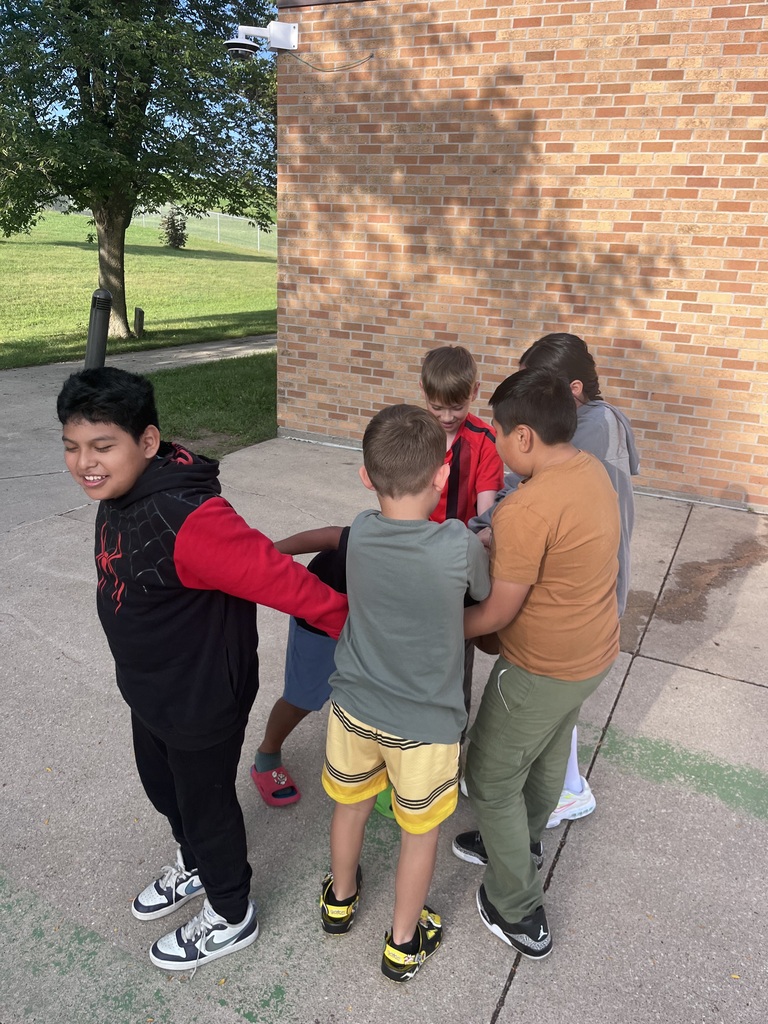 5th graders practicing their teamwork with the Human Knot