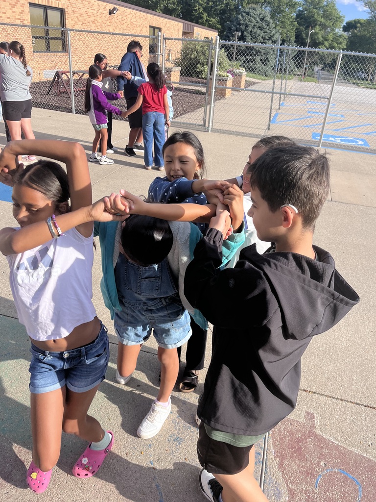 5th graders practicing their teamwork with the Human Knot