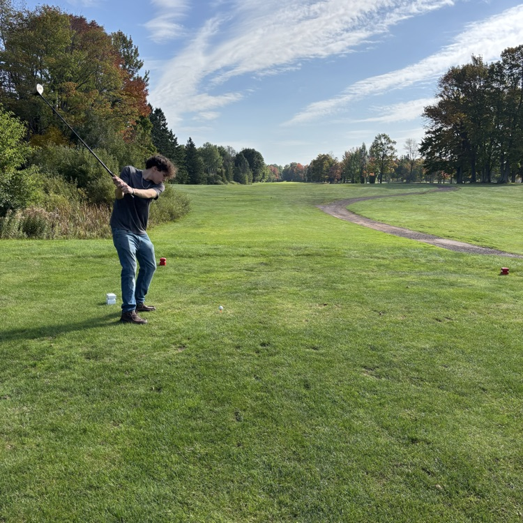students hitting the ball