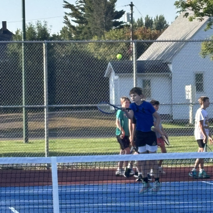 students playing tennis