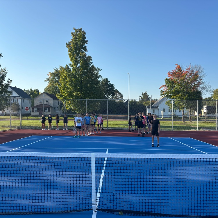 students playing tennis