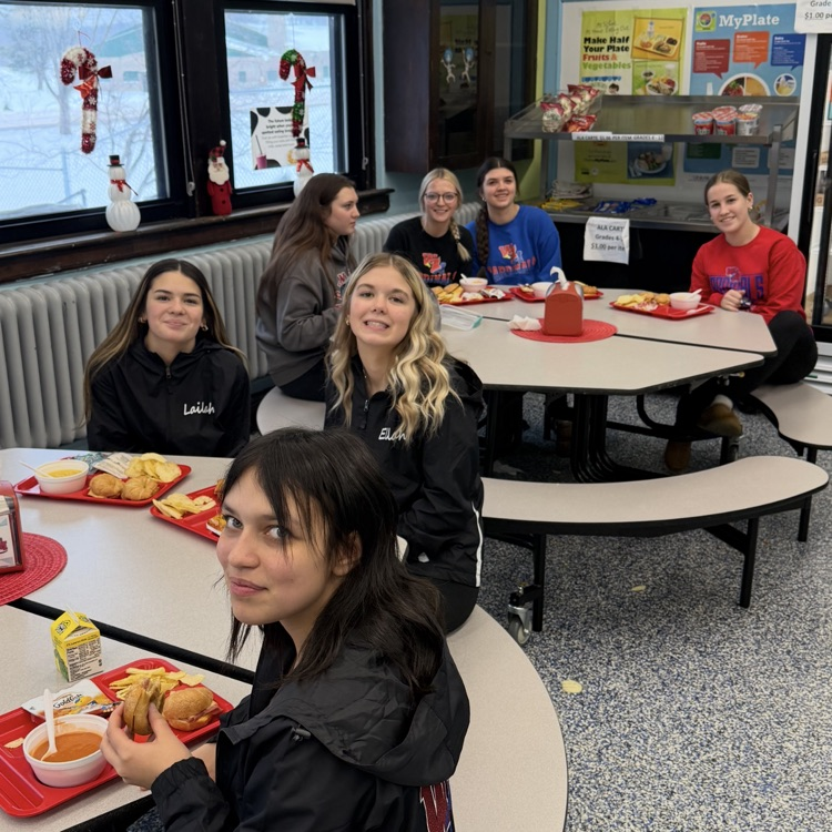 High school girls enjoying their soup for lunch