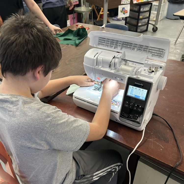 student sewing