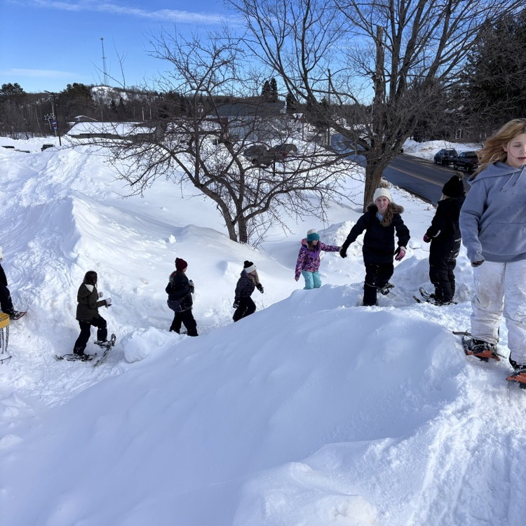 students snowshoeing 