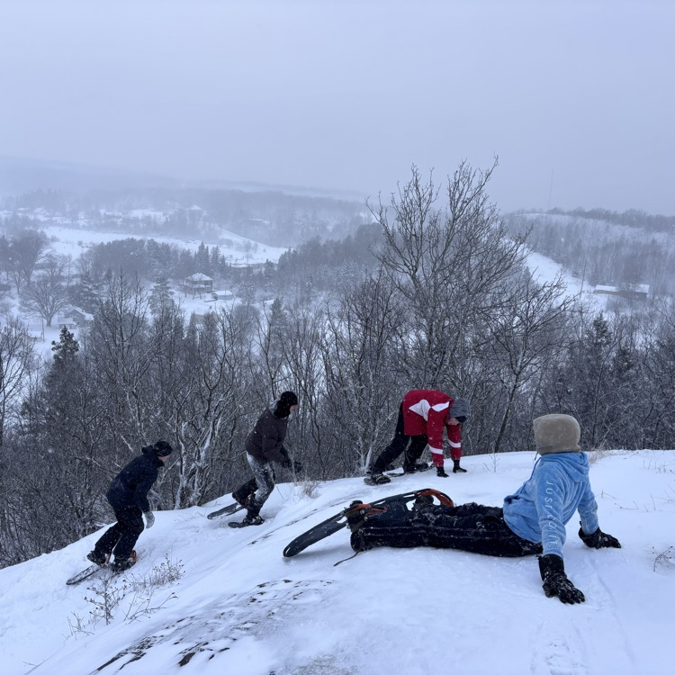 students snowshoeing 