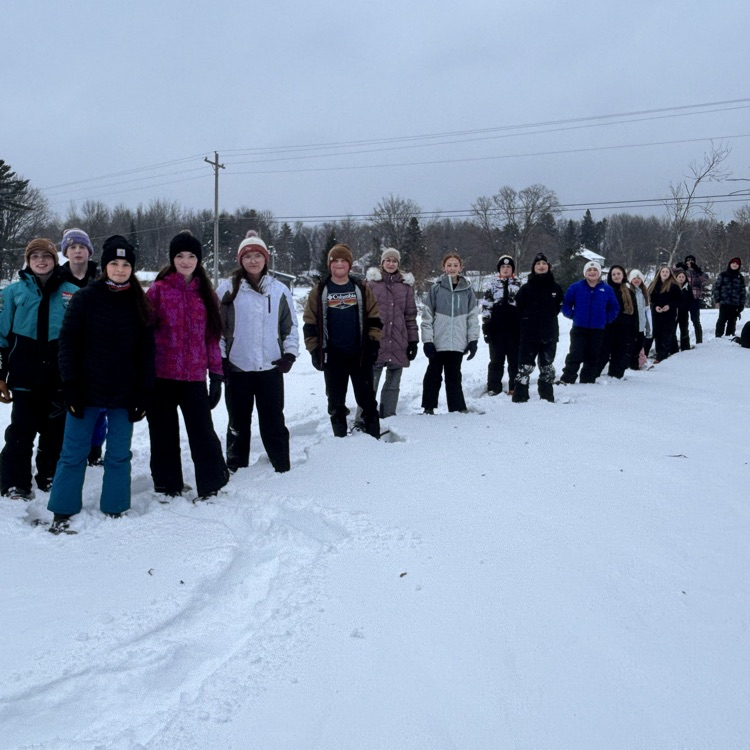students snowshoeing 