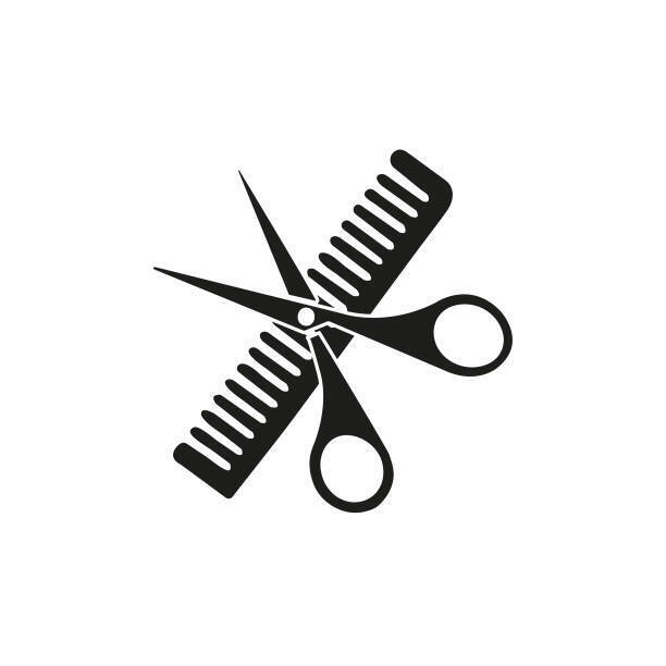 a picture of a comb with a pair of scissors over top
