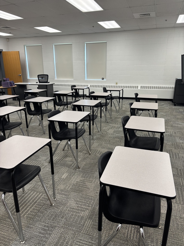 a graphic of our new black student chairs and desk. This pictures shows the classroom filled with the desk and chairs