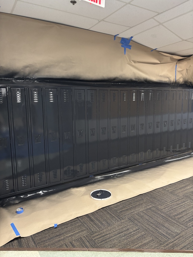 Graphics of the middle school lockers painted black