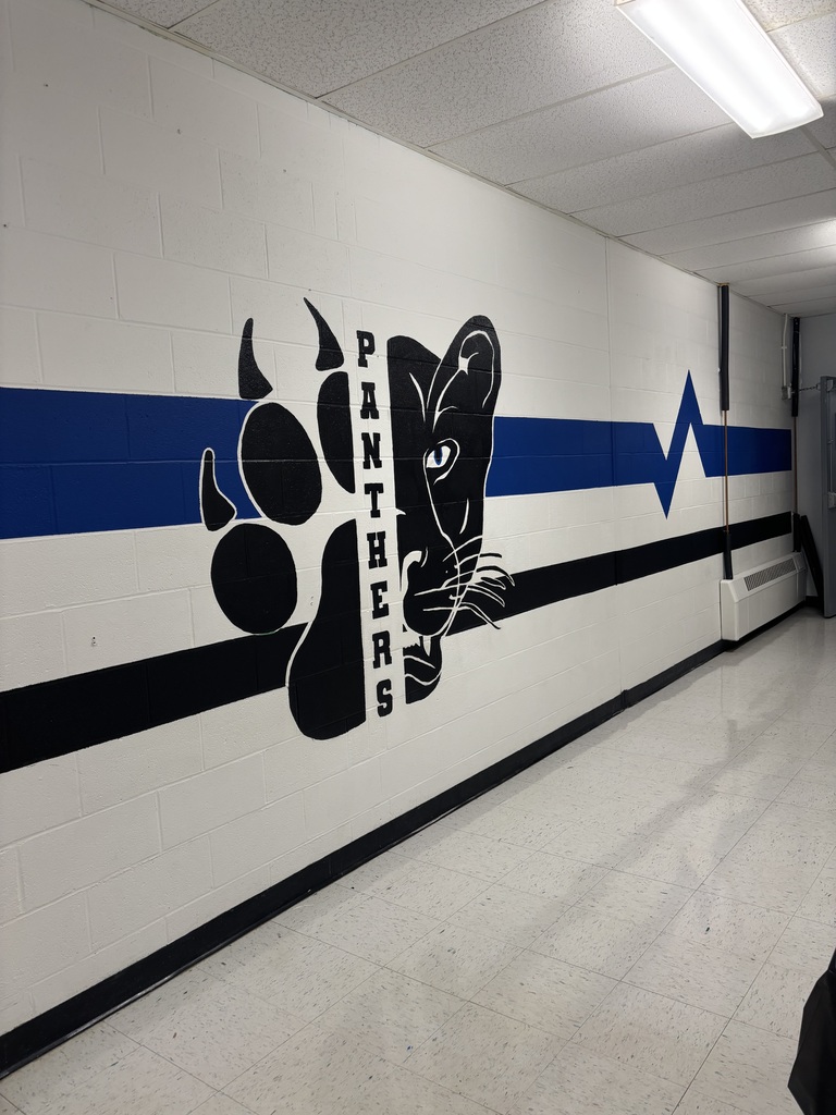The panther with the blue and black paint completed
