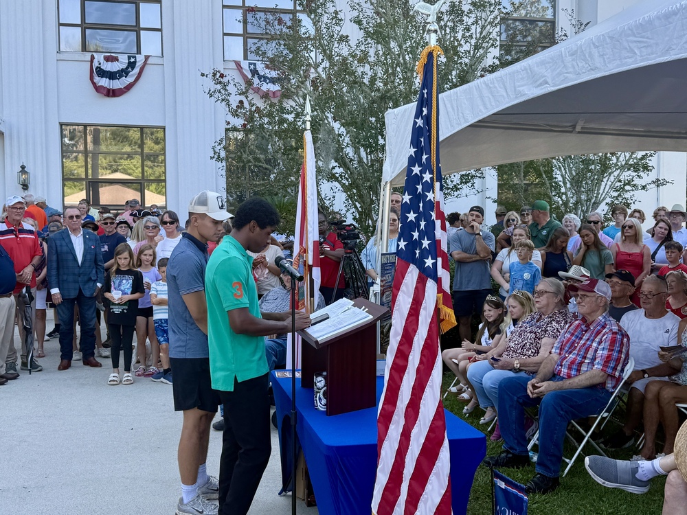 Aaron Robinson, Wakulla High School Class of 2026 speaking to crowd at the 1976 Timecapsule unburial.