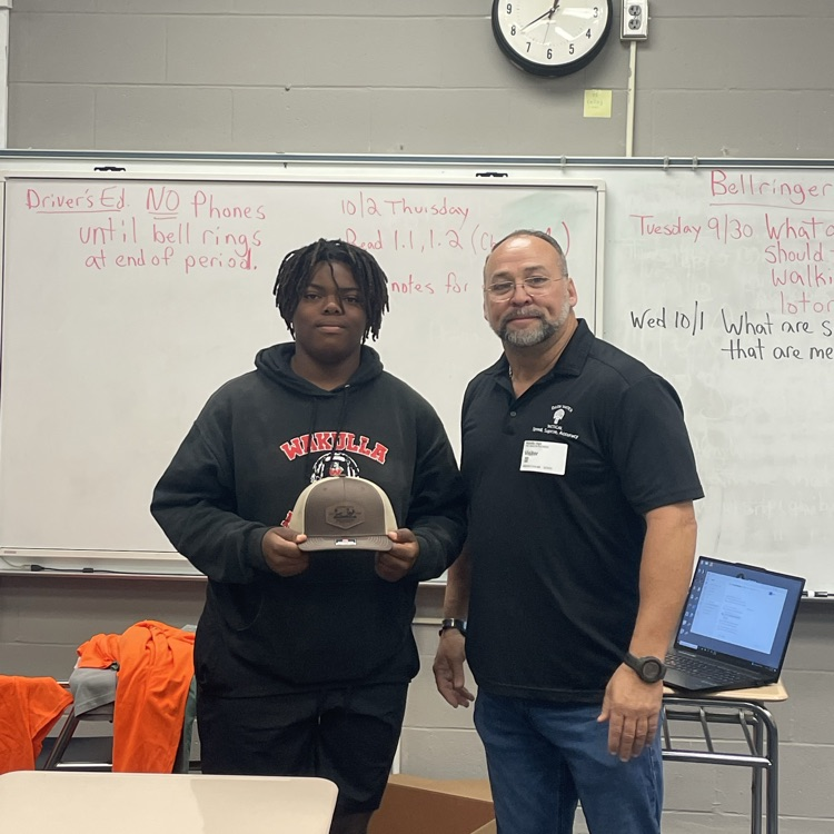 Commissioner Fred Nichols and student