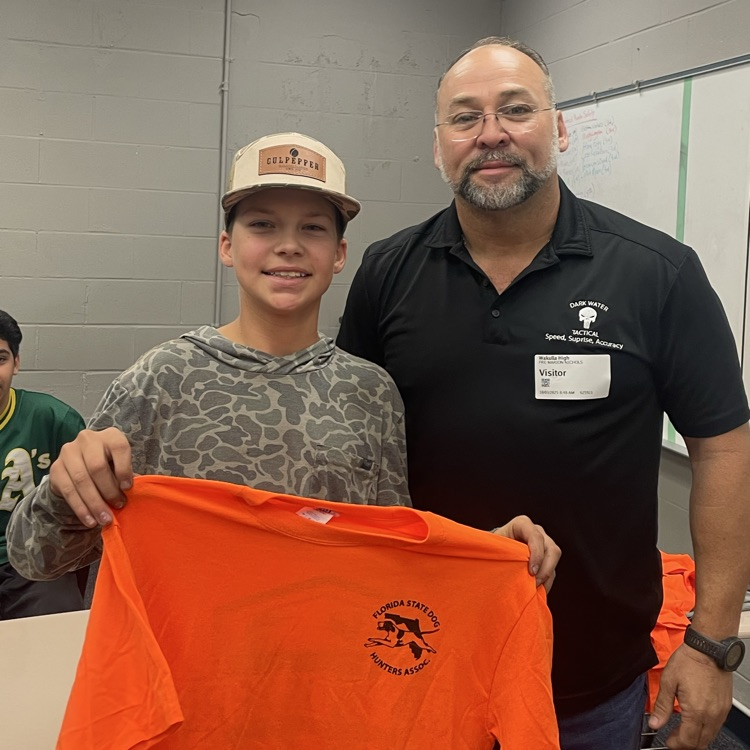 Commissioner Fred Nichols and student