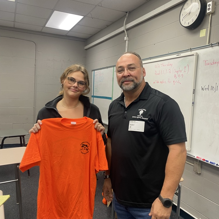 Commissioner Fred Nichols and student