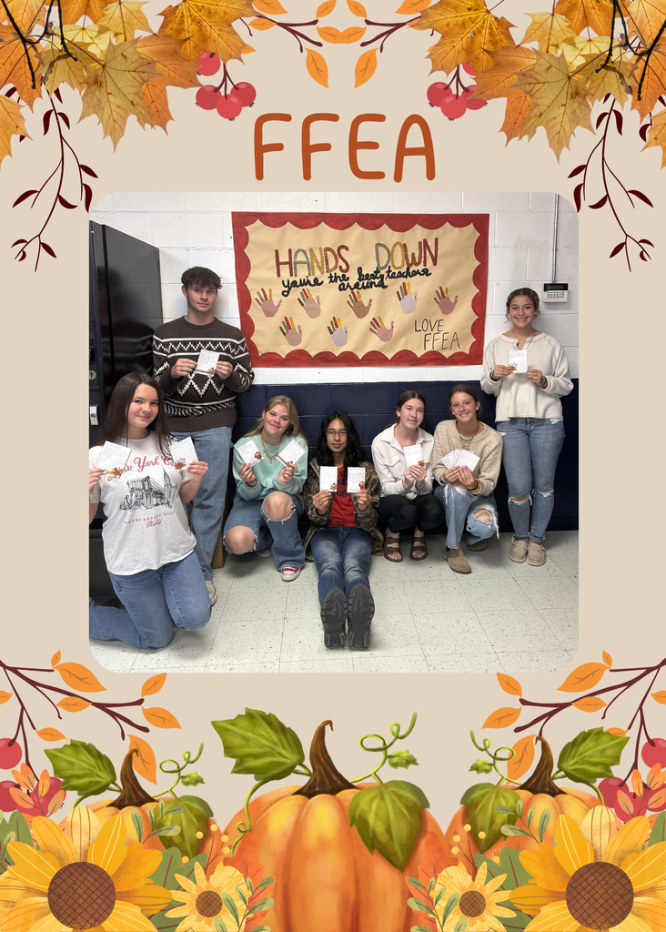 FFEA students holding thank you cards they wrote for their teachers.
