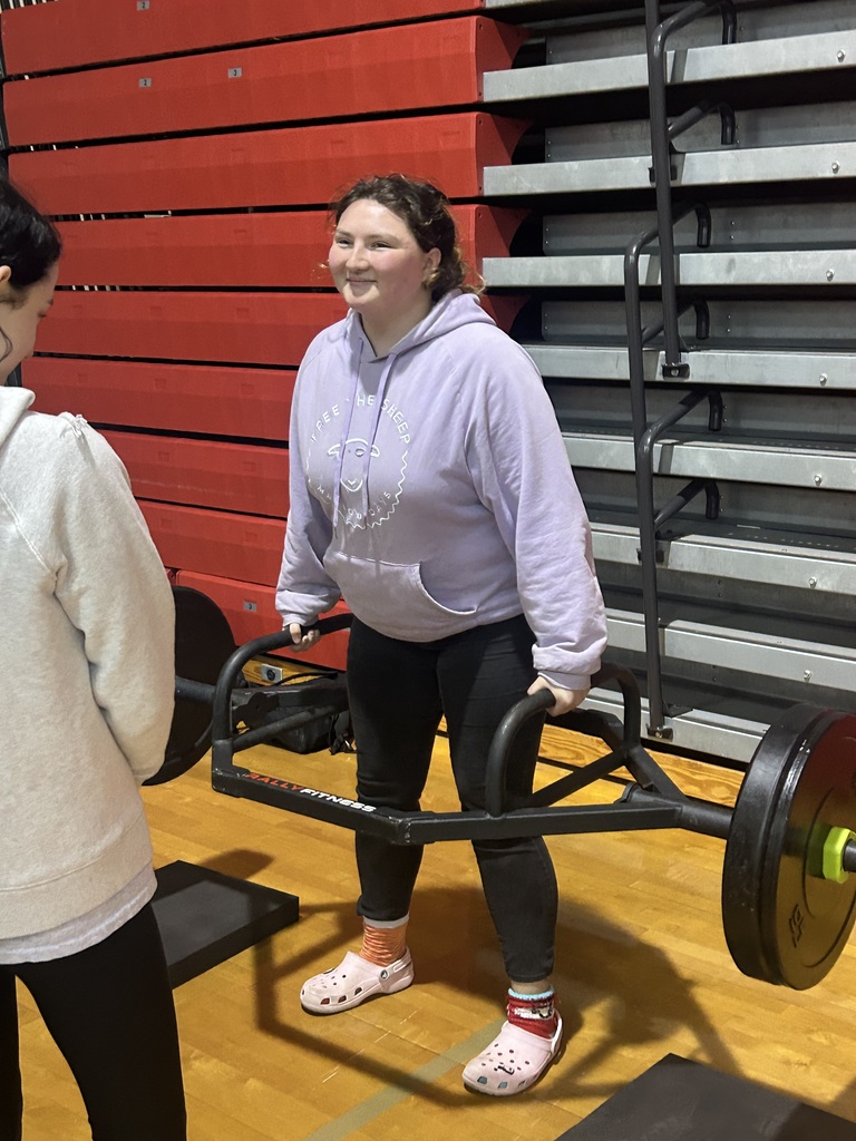 Girls lifting weights 