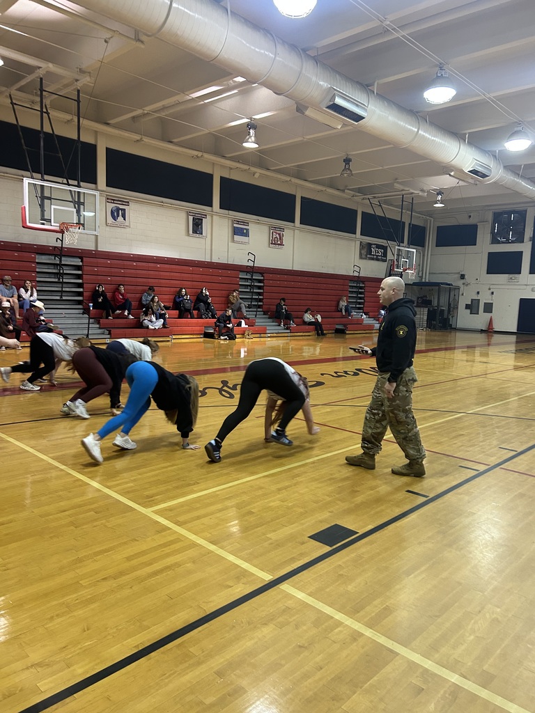 Students racing doing bear crawls