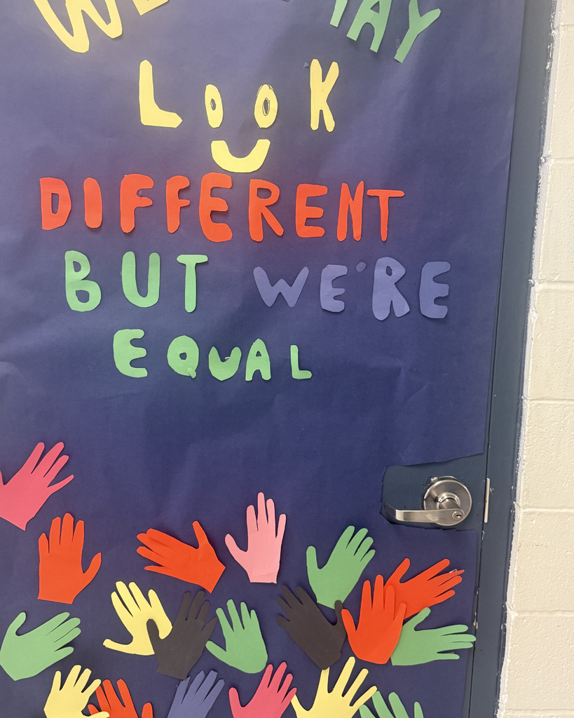 Black History Door Decorating Contest. Handprints saying We May look different by we're equal