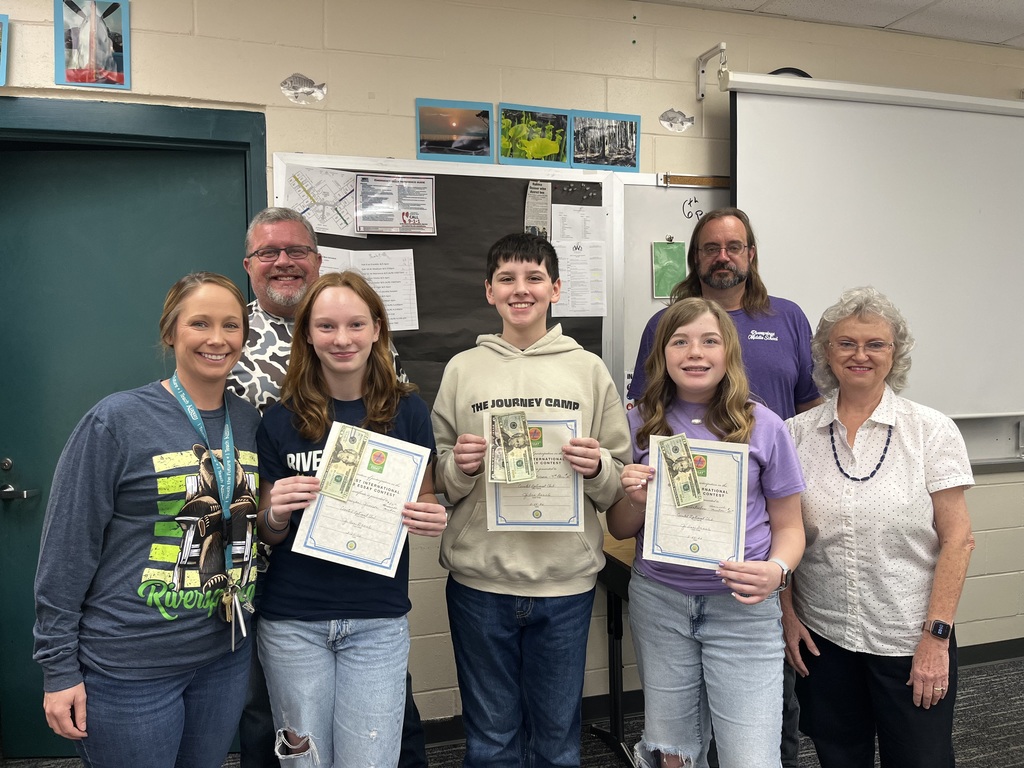 Students who placed in the Optimist essay contest