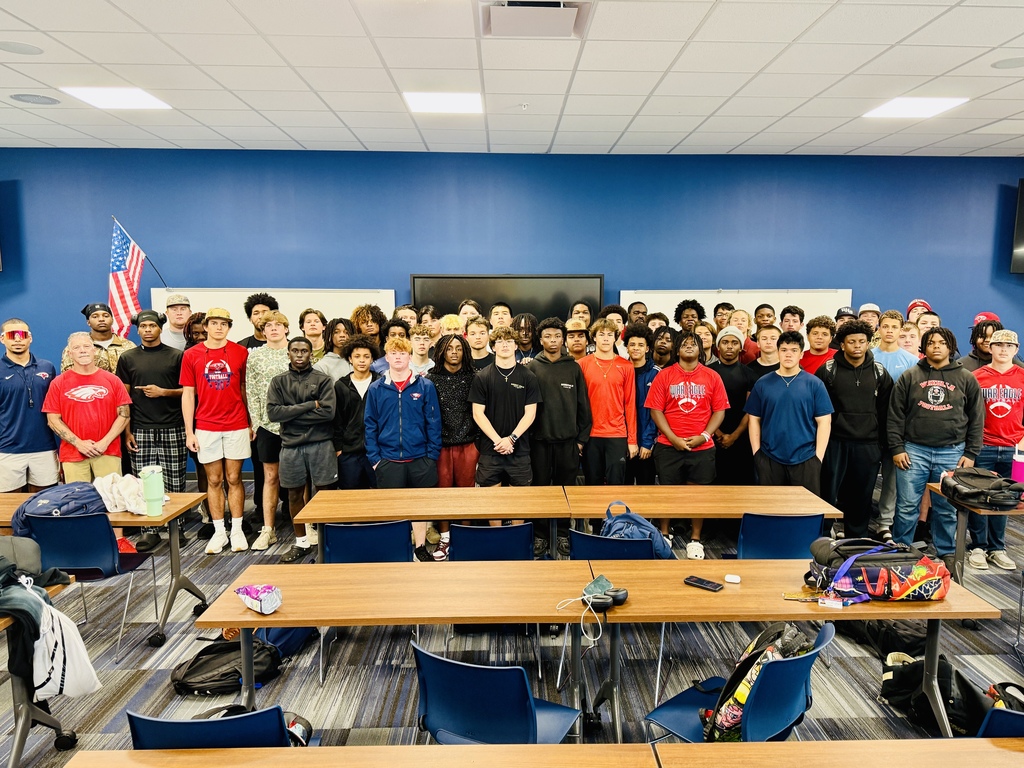  New Head Coach Allen meets with football players