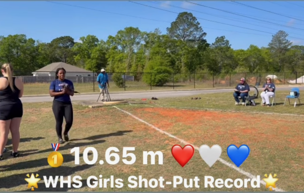 Sion Garrett with the Girls Shot Put Record