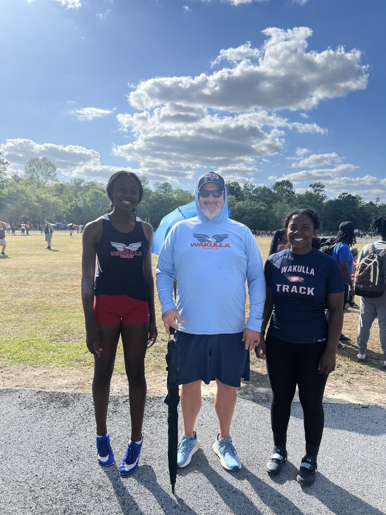 Track girls with their coach