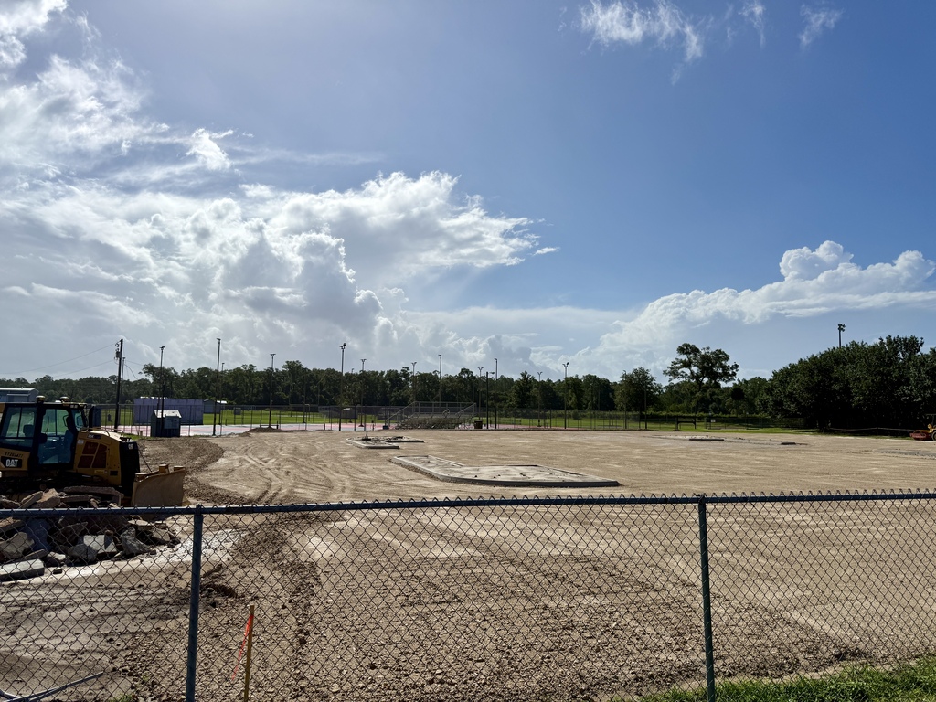 New parking lot outside baseball and tennis