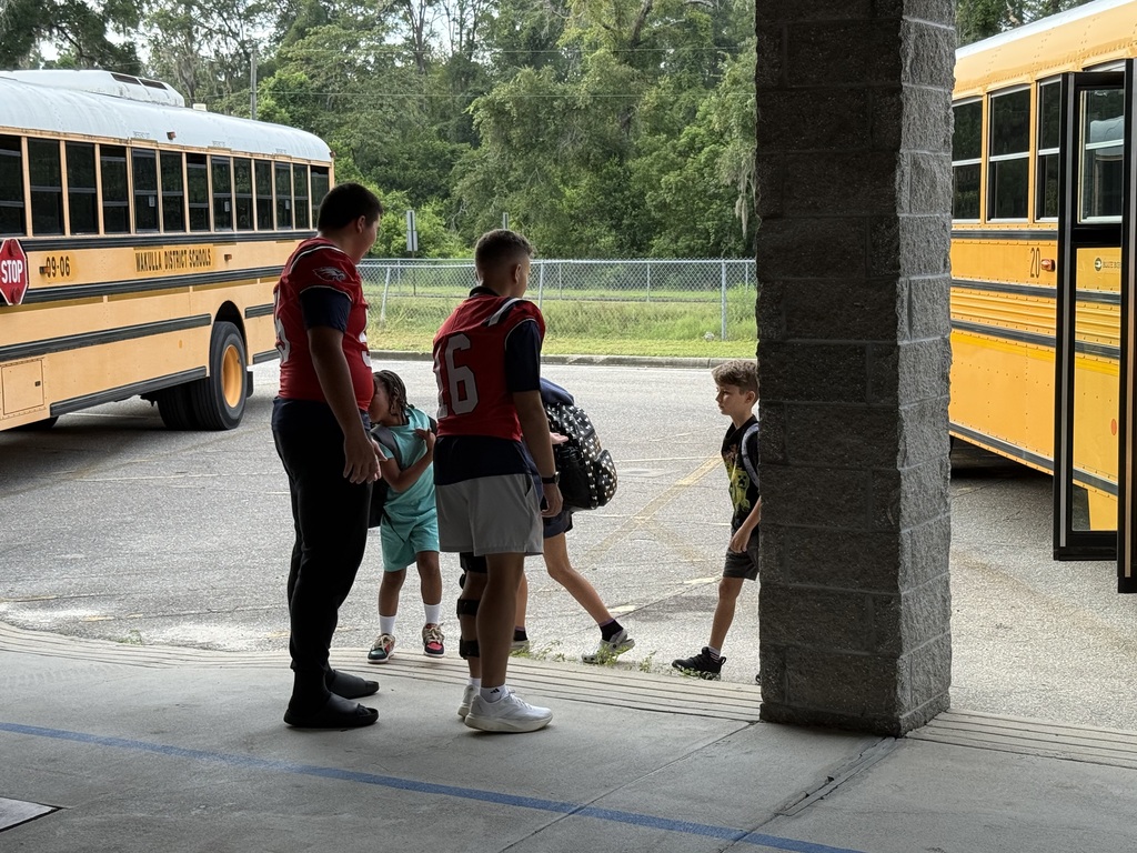 Wakulla High School football seniors welcomed students at Medart Elementary 
