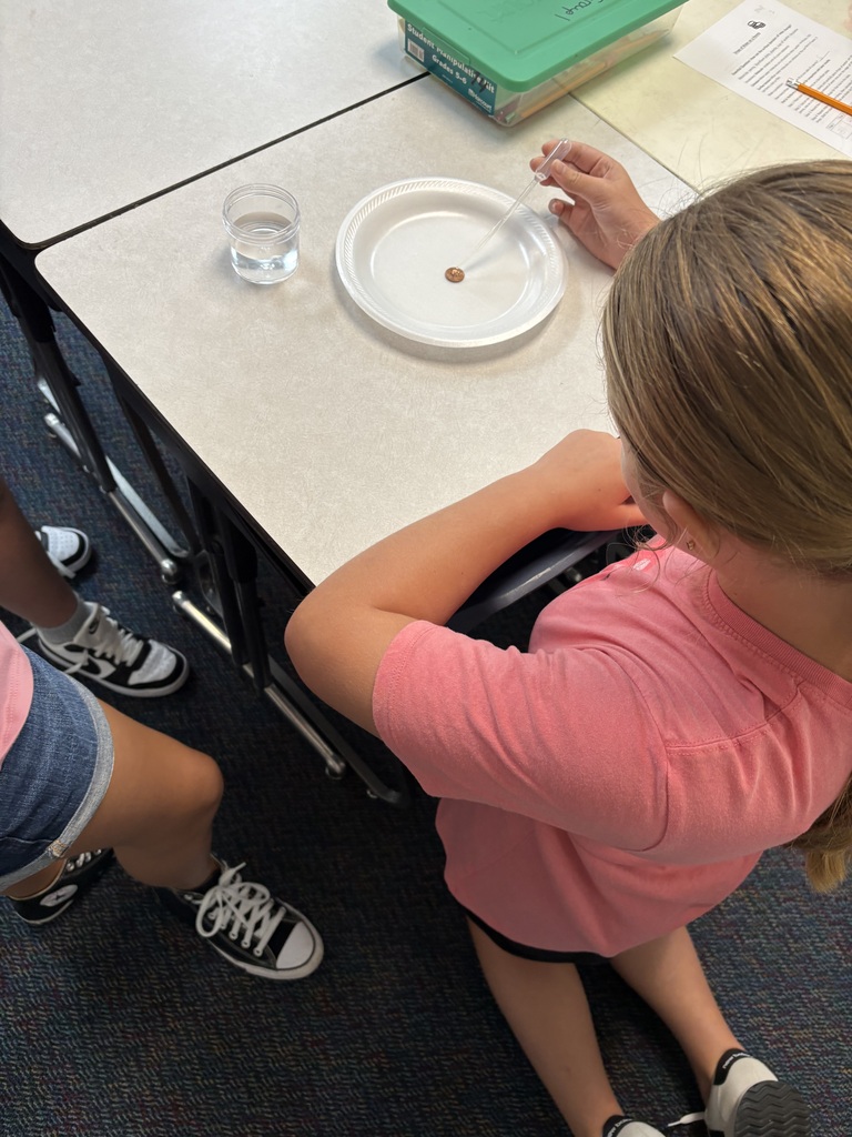 5th graders doing a fun science experiment 