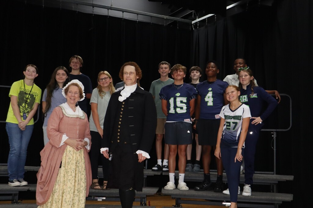 Students pose for a picture with Founding Voices 