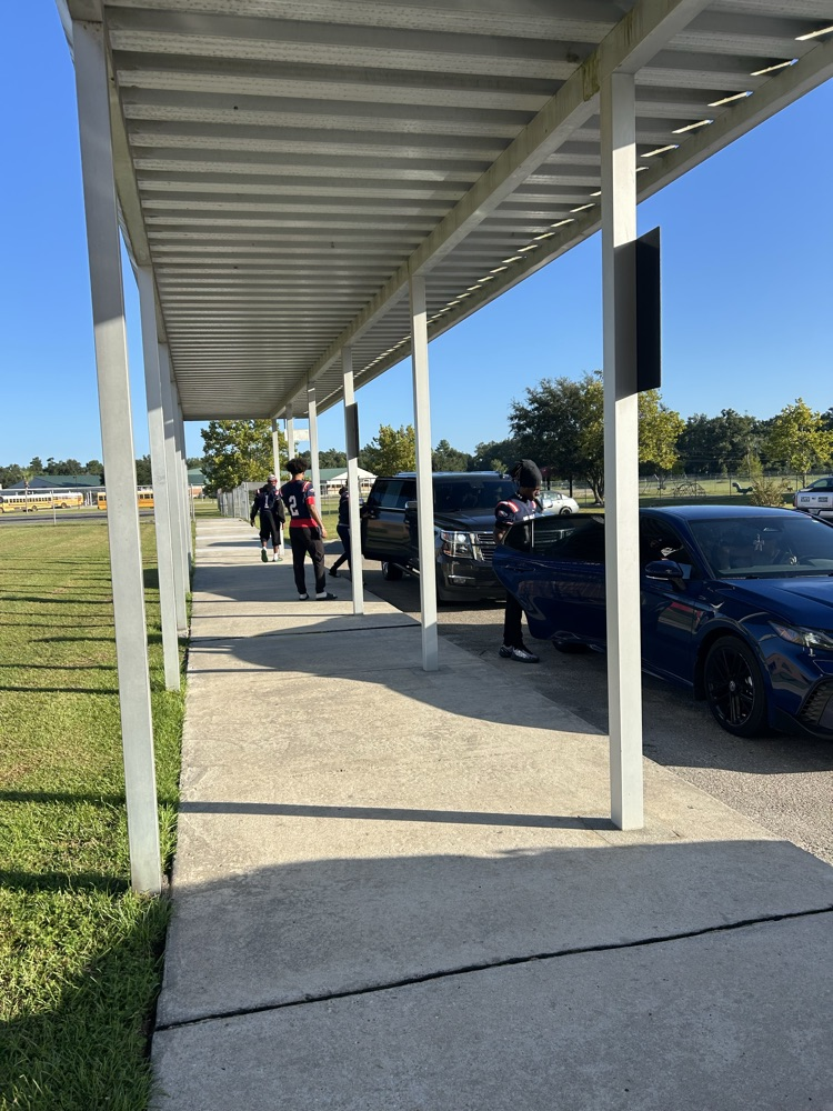 WHS Football Players helping with morning drop off 