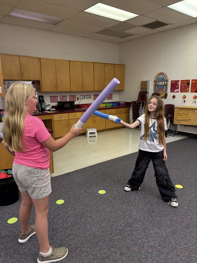 students practicing steady beat