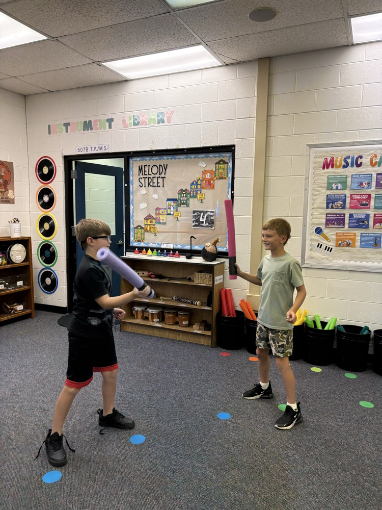 Students practicing steady beat