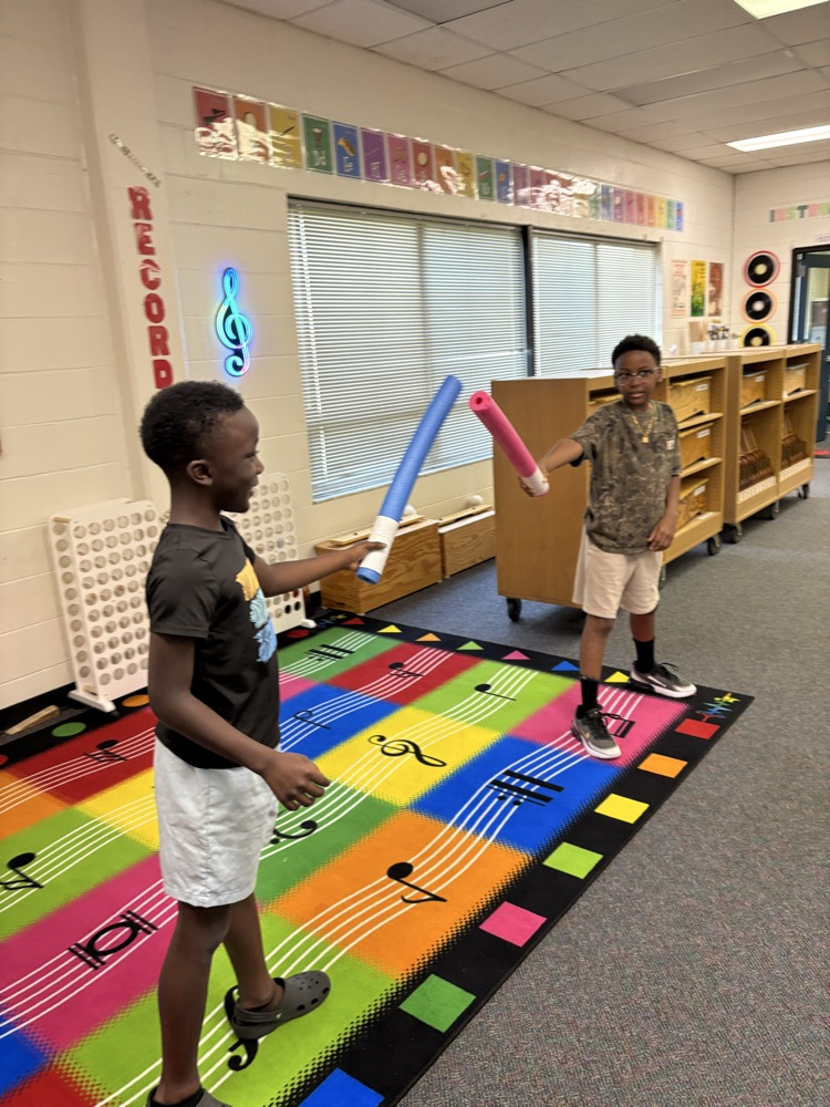 students practicing steady beat