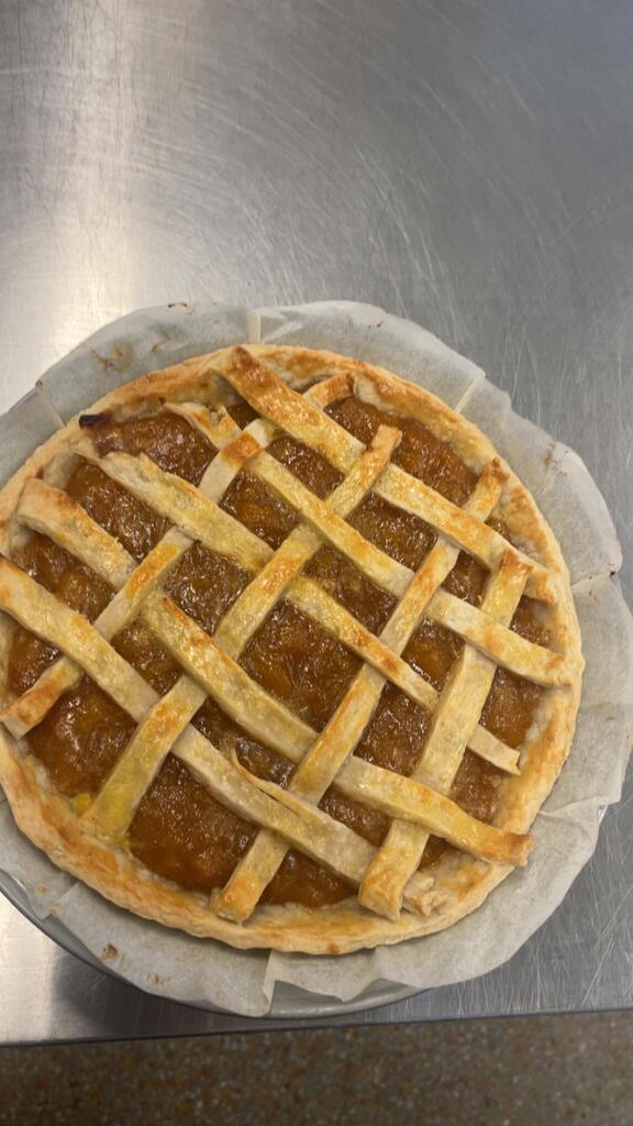 Halfway to Pi Day called for pie! 🥧  On September 14, our Cooking Methods students celebrated by making peach pies from scratch. Cooking Methods is part of WHS’s Hospitality and Tourism CTE program, where students build their skills through hands-on experiences like this one.  And yes, the results look delicious!