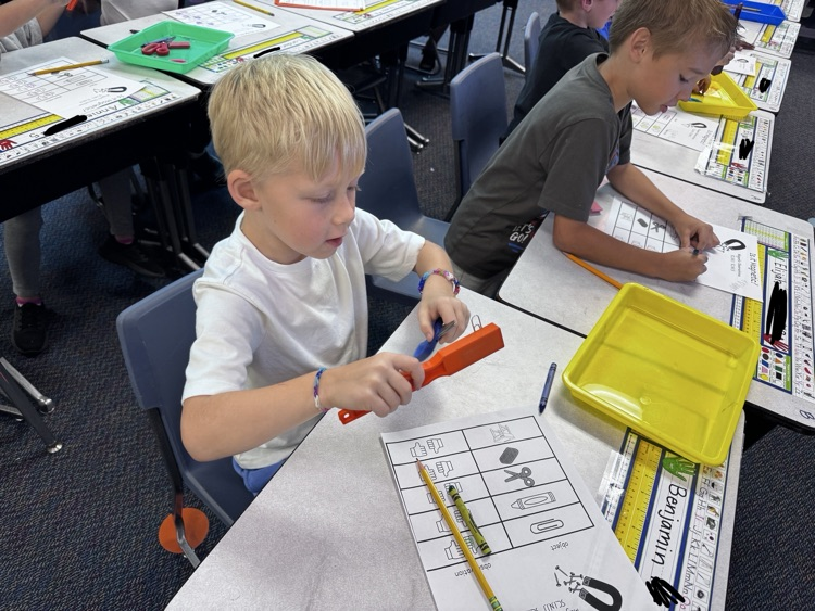 Mrs. Strutz’s class uses their investigation skills to determine if objects are magnetic.