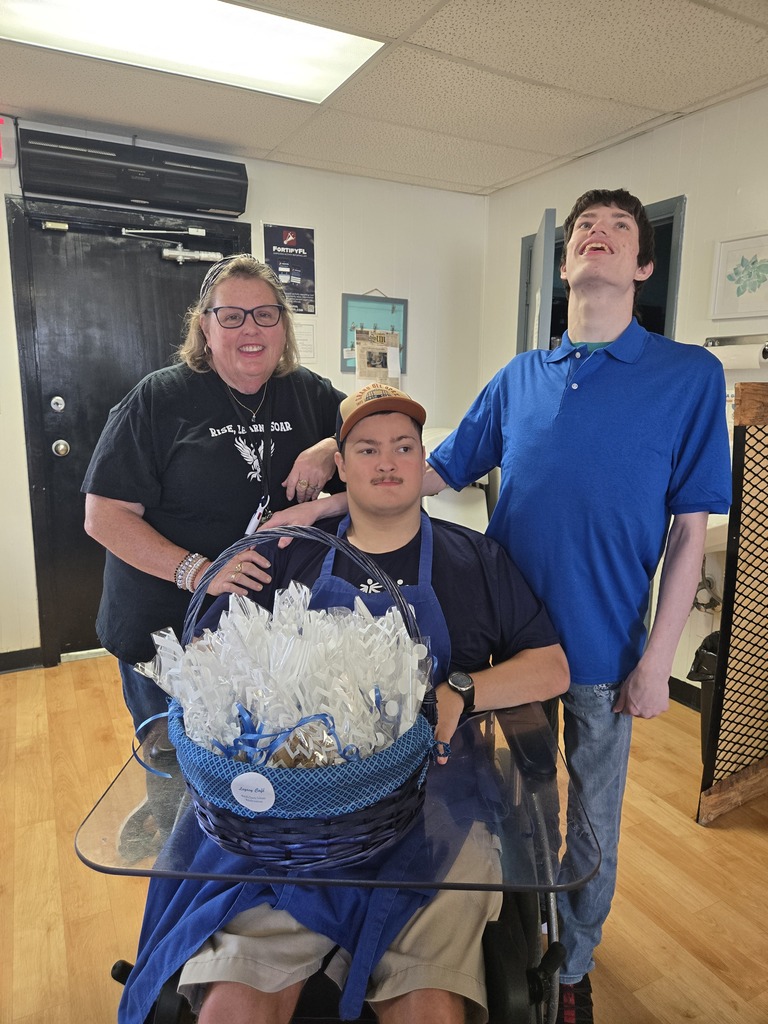 Ms. "Sharon" with 2 students (in the VI program) working in the Cafe'