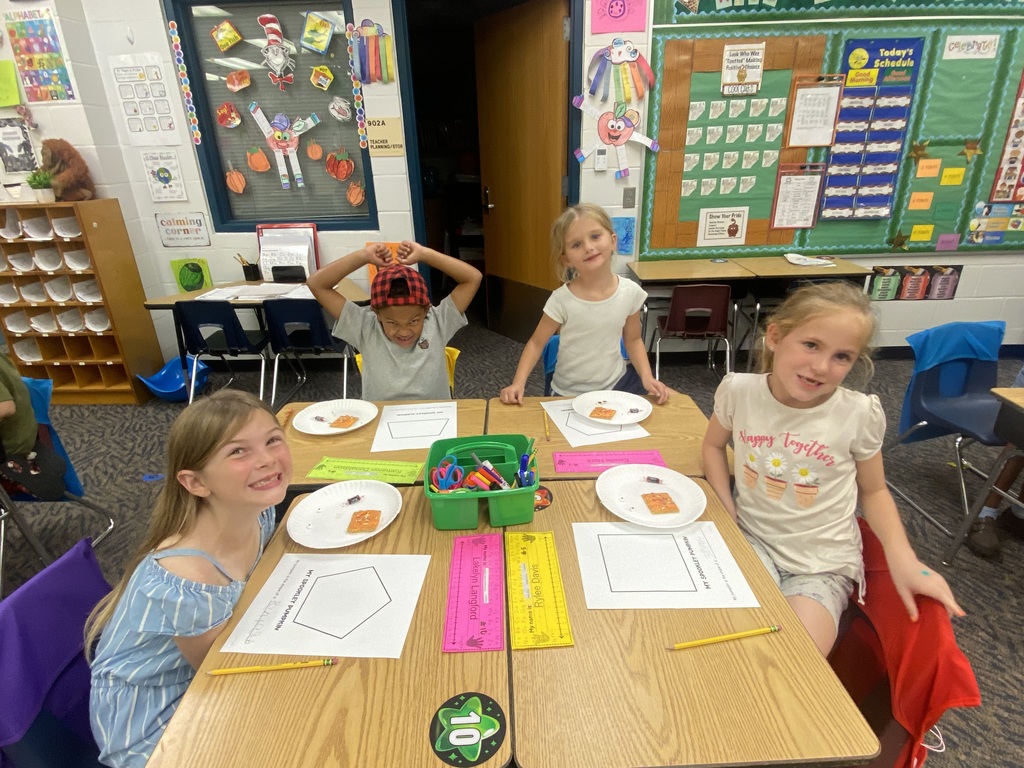 students with craft and snack