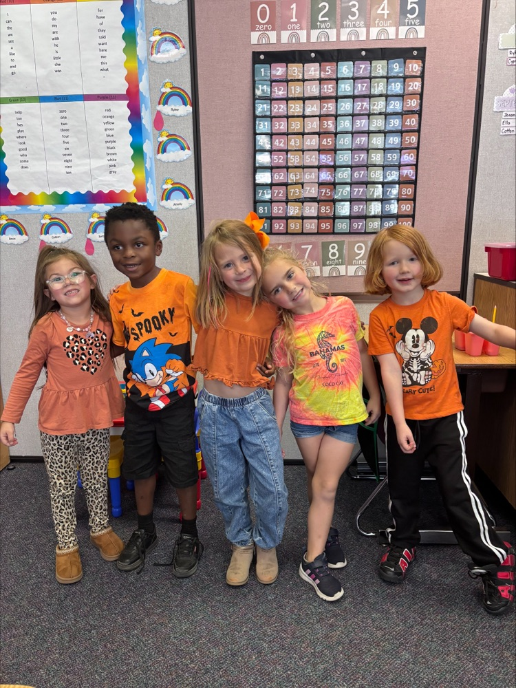 students wearing orange