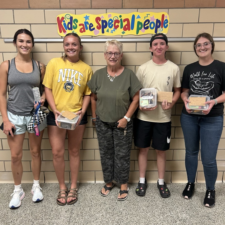 Wallace grads working at the school