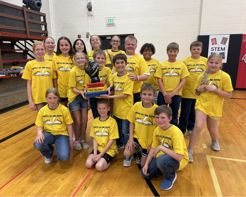 The group of students that attended battle of the books with our Honeybee Champion Trophy!