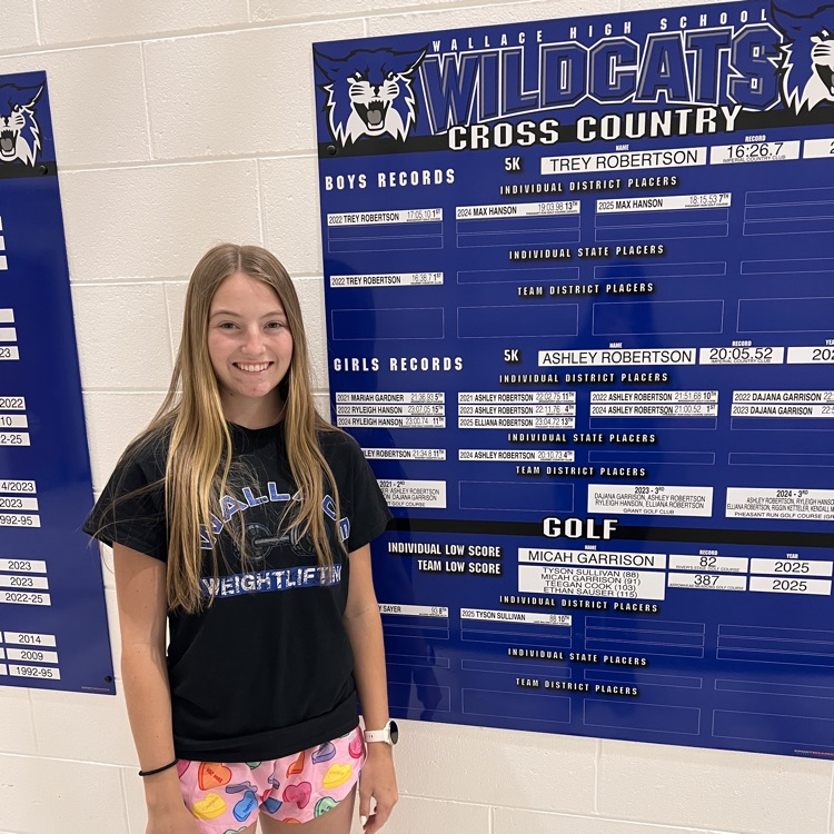 Elliana and the cross country record board 