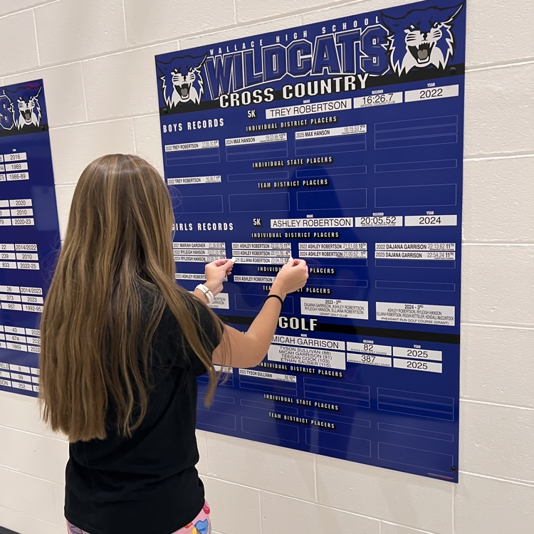 Elliana and the cross country record board