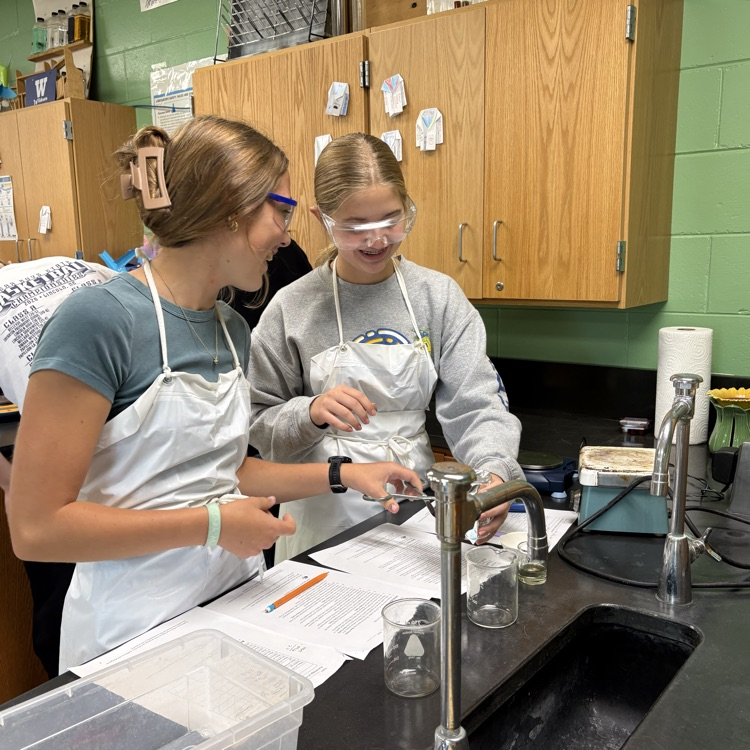 Lydia  & Riggin working, thinking, and laughing a bit  